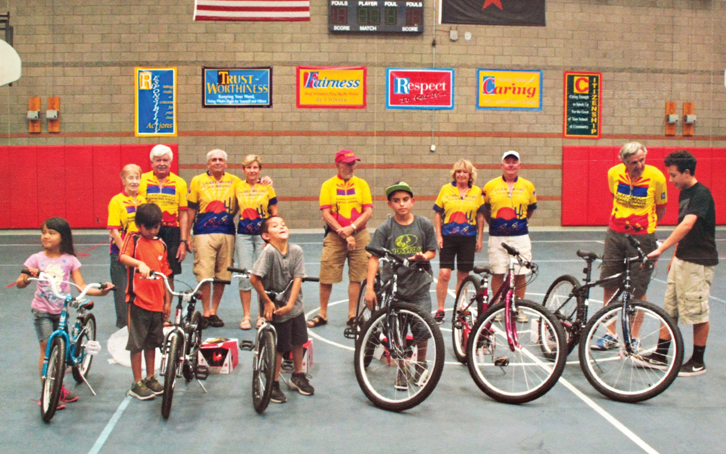 The CycleMasters enjoyed presenting bicycles to these deserving students.