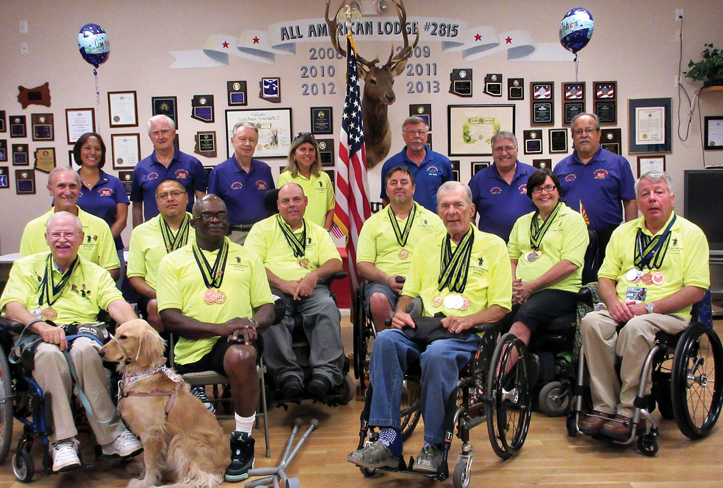 From left, front row: Joe Chitty, Arthur Parson, Jack Grams; second row: Paul Carter, Larry Moses, Leslie Craddock, Steve O’Brien, Pam Foley, Steve Hymers; back row: PERs Gloria Cisneros, Jim Cox and Larry Megahan, Arizona veterans. Wheelchair Games coach Karen Gialle, PERs Earnest Cruce, Jack Baillargeon and Richard Esparza