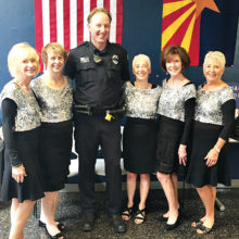 Pictured with Officer Charley Foley are Linda Schuttler, Laurie Page, Vivian Herman, Ann Kurtz and Claudia Booth.