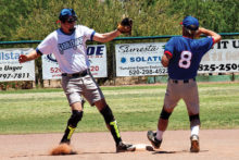 Game 2: Steve Schneck makes the play at second base to try to get Jeff Rayner out. What did the umpire say? Photo by Cathy Purcell