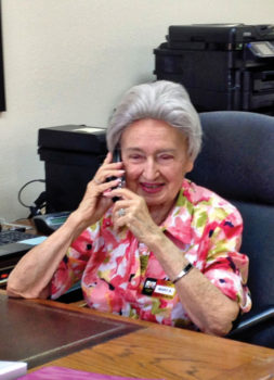 Mary Anderson, loyal Monday morning receptionist, staffs the phone at SBCO Office.
