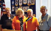 President Joe Guyton, Joe McGowan and Jim Lamb welcome Wendy Guyton to SaddleBrooke Rotary.