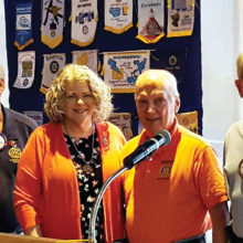 President Joe Guyton, Joe McGowan and Jim Lamb welcome Wendy Guyton to SaddleBrooke Rotary.