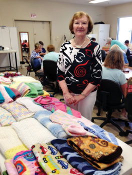 Eileen Bartsch has knitted many baby items that go to Family First.