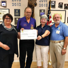 Sig Danielson, Exalted Ruler of the Catalina Mountain Elks Lodge No. 2815 and Ira Cohen, Arizona Elks Major Projects Coordinator present a check for $1,000 to Teens Sew Cool President Linda Shannon-Hills and Executive Liaison Kathleen Morgan Squires.