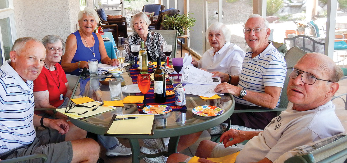 Looks like a party but it really was a fun Social Committee meeting of the SaddleBrooke Singles to plan the 2016-2017 Season. Left to right: Ray Peale, Virginia Hegseth, Barbara Brown, Dorie Dell, Micki Johns, Danny Howells and Barry Katkowski; photo by Bob Lamb.