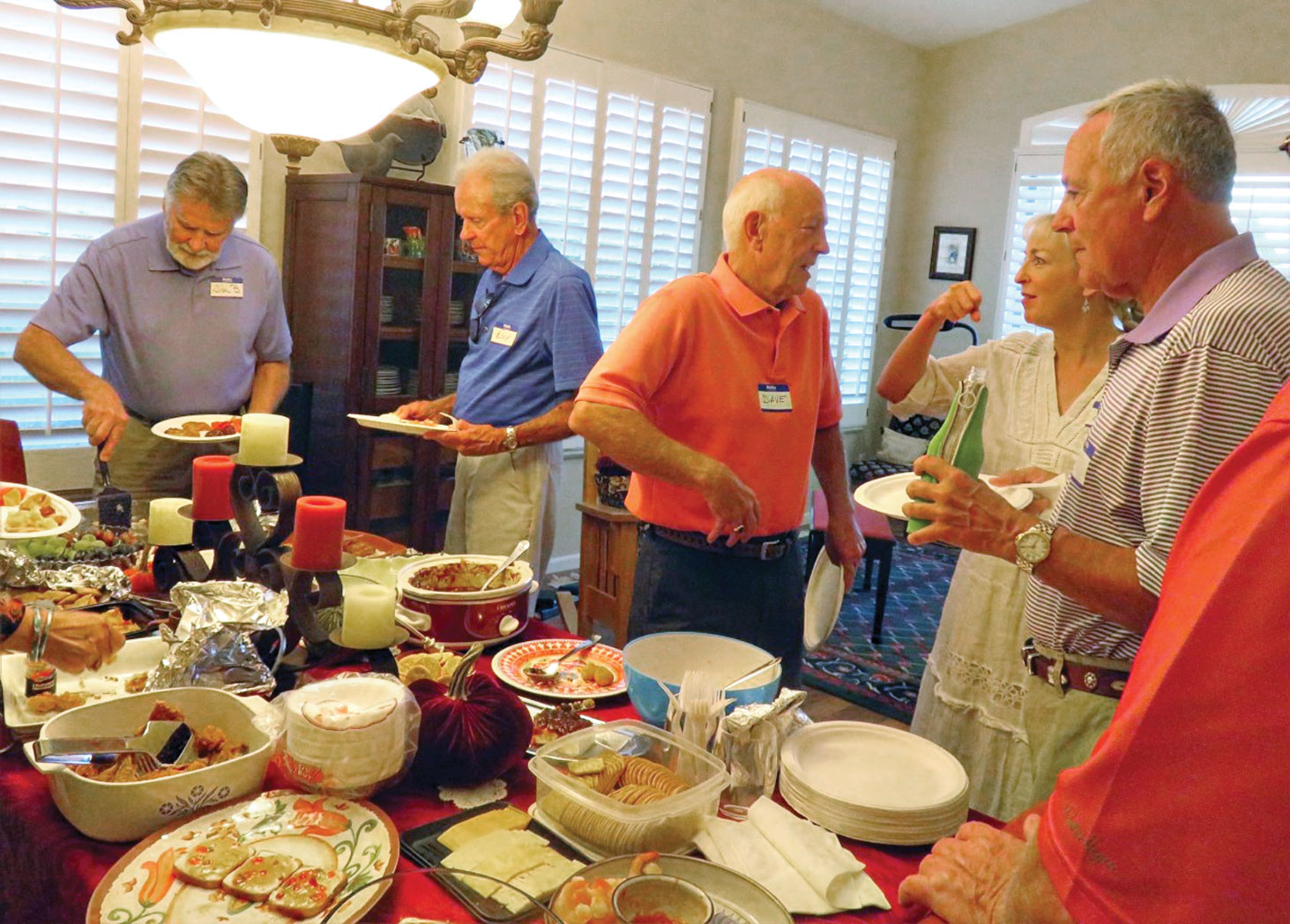 Snacks and chatting at the Grinstead house; photo by Ron Talbot