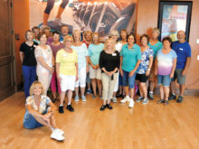 These happy Level 1 dancers (mostly from SaddleBrooke) visit the Hacienda Clubhouse at SaddleBrooke Ranch on an October Monday. A few times this fall, banquet conflicts have allowed Line Dance lessons with Rebecca to take road trips up to our welcoming neighbors at the Ranch. Thanks to the Ranch management for making our dance weeks complete.