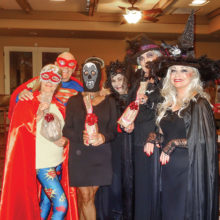 And the winners of the Unit 21 Halloween Costume Contest (left to right) are: Pat and Ron Andrea – Supergirl and Superman - winners of best superhero/heroine category; Midge Mollenkopf - Face from Your Nightmares - winner of best Halloween/monster are Pat Anderson, Sherry England and Connie Wortman – The three widowed witches of SaddleBrooke - winners of best couple (real or fictional) who were actually a trio.