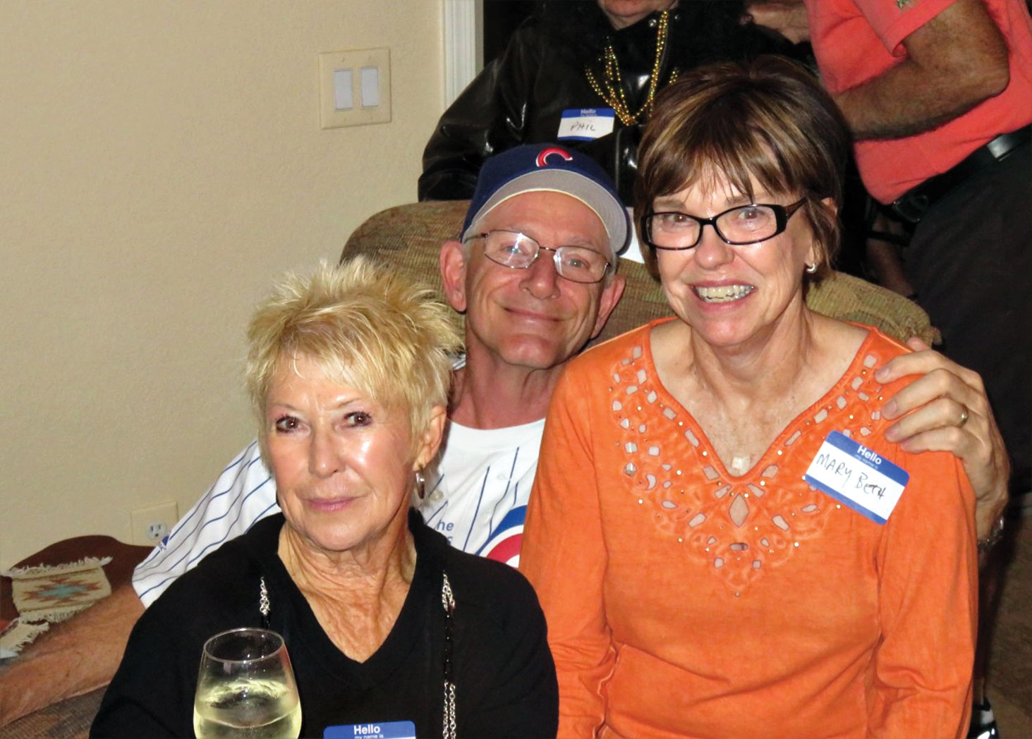 Chicago Cubs fan Bud Snyder with his fans, Mary Beth and Phyllis; photographer, Ron Talbot
