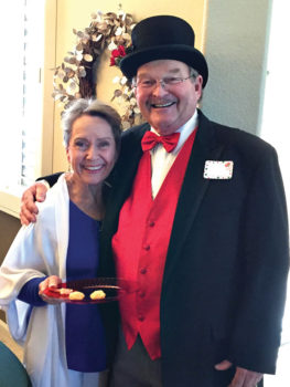 Vicki Tessatore and Ron Kari – one of Santa’s serving elves and a grateful guest
