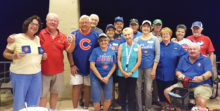 SaddleBrooke Windy City Club members gathered last fall to cheer on the Chicago Cubs as they began their victory march to the World Series title; photo by Linda Schuttle