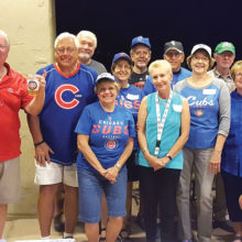 SaddleBrooke Windy City Club members gathered last fall to cheer on the Chicago Cubs as they began their victory march to the World Series title; photo by Linda Schuttle