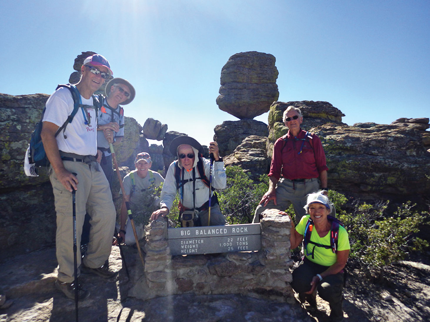 At the Big Balanced Rock in the Heart of Rocks area of Chiricahua National Monument are, left to right: Larry Linderman, Joe and Joyce Maurizzi, Aaron Schoenberg (guide), Niel Christenson and Jackie Hall; photo by Aaron Schoenberg