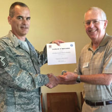 Colonel Rett Benedict presents a Certificate of Appreciation to guest speaker Chief Master Sergeant Thomas J. Brandhuber.