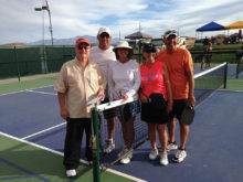 Players standing around after they have won matches might opt to pitch in and try refereeing.