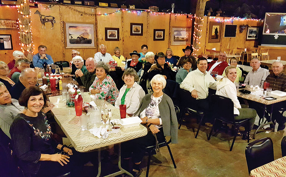 Twenty-eight Rotary members get a taste of cowboy life at Cadillac Chaparral Steakhouse and Saloon.