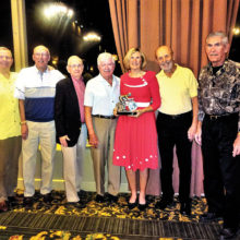 2016 Cyclist of the Year winner Linda Monfore, along with previous award winners Mike Brenny, Tom Erb, Bob Halk, Bud Chase, Ed Haugland and Ken Luthy.