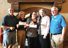 Ronald McDonald House check presentation, left to right:, SaddleBrooke Rotary Fore for Kids Event Chairman Robert Christadore, Director and CEO of Ronald McDonald House of Southern Arizona Kate Jensen, Director of Development Ronald McDonald House of Southern Arizona Nancy Kirk, SaddleBrooke Rotary Event Coordinator Wendy Guyton and President of SaddleBrooke Rotary and Joe Guyton