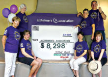Standing, left to right, are Sue Hagerty, Terry Coe, Barbara Starrett and Al Spaet; seated are Linda Depew, Joyce Honorof, chairperson and Sue Young.