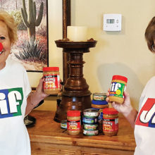 Savo Fries and Patti Albaugh sport Jif Peanut Butter shirts as a reminder of the Protein for Growing Minds project. Savo Fries, never one to miss an opportunity for humor, has a clown nose to commemorate Red Nose Day, a nonprofit activity to help disadvantaged children.