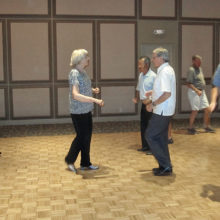 Jeanny and Wally Mara leading a dance class