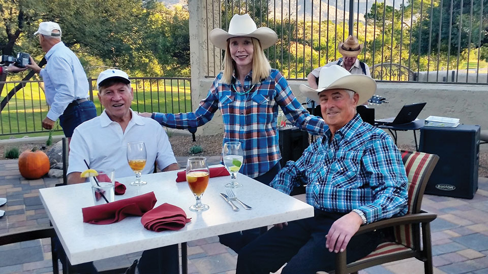 Laurie and Mike Bendon and Gene Wakefield say fetch a friend for delicious chow and a hog-killin’ time!
