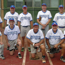 The Charles Company team, with manager Ron Quarantino, dominated Monday softball; photo by Pat Tiefenbach.