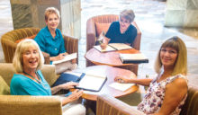 Working on Fashion Show arrangements are, left to right: Diane Ewing, chair, Dianne Ashby, Andrea Stephens and Carolyn Reygers