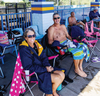 Jeanie and Mike Polak relaxing after competing in the State LC Championship Meet; photo by Rodger Bivens.