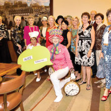 Volunteers modeled clothing and accessories hand-picked from the Golden Goose inventory in last year’s Alice in Wonderland-themed fashion show.