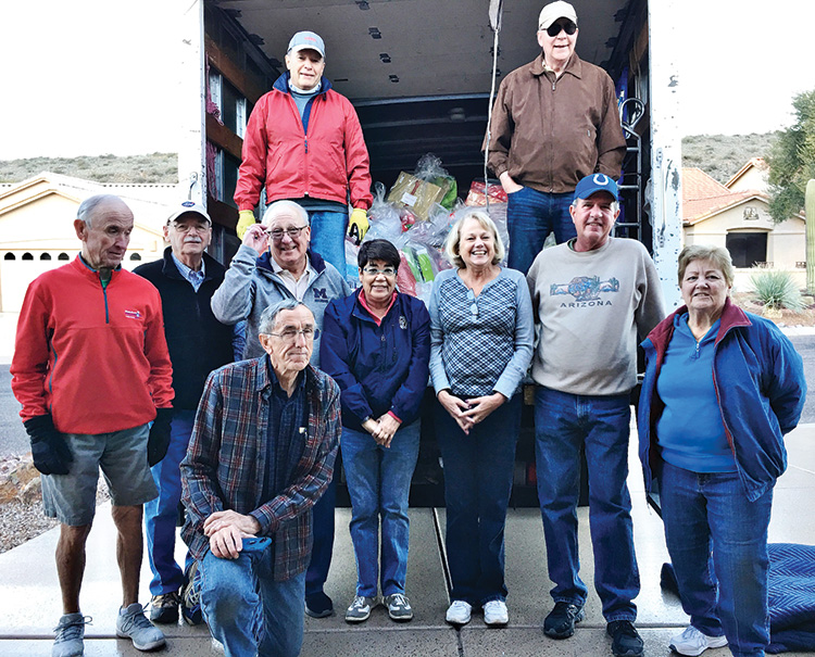 In 2018, SaddleBrooke volunteers loaded the Impact of Southern Arizona truck for delivery of gifts to Apache children in San Carlos.
