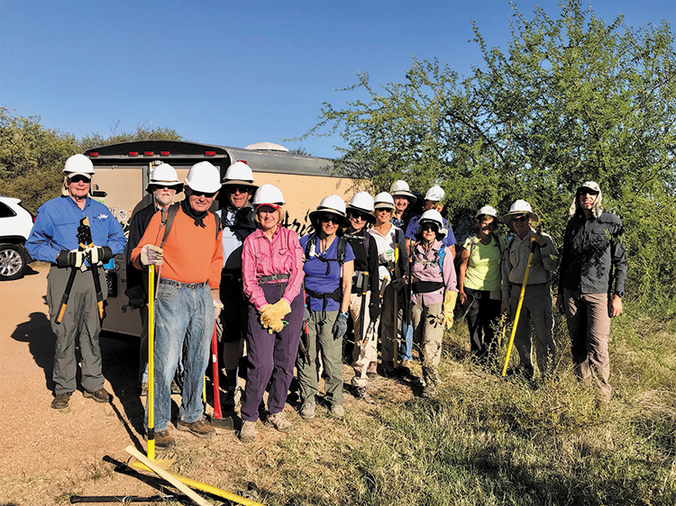 SaddleBrooke hikers participate in an October work party on the Arizona Trail. Photo by Gary Faulkenberry.