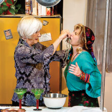 Susan Sterling (Gussie) and Connie Ward (Carmen)’s food fight; photo by Steve Weiss