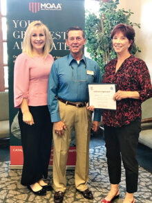 Gina L. Osborne, Col William Nagy, and Constance Y. Huff