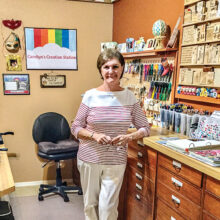 Carolyn in her craft room; photo by Keith McLean