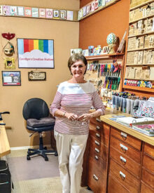 Carolyn in her craft room; photo by Keith McLean