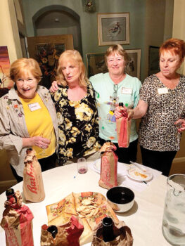 Four of the seventeen ladies who attended the first-ever WOOO wine tasting, held at the home of Jeannie Israel (on the far left).