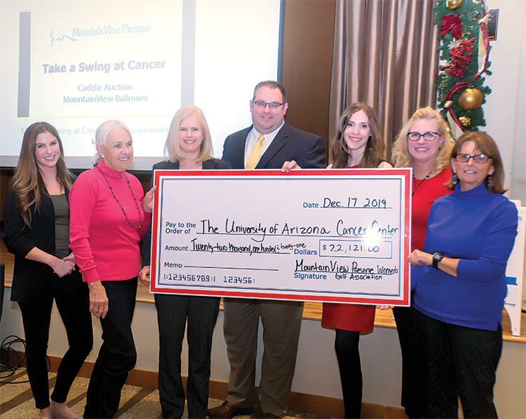Check to UA Cancer Center. Left to right: Liz Benzie, Ironwood Dermatology, tournament sponsor; Sharon Marchione, MPWGA; Julie Bauman, Director UA Cancer Center; Chad Adams, Associate Director of Clinical Research, UA; Megan Guthrie, UA Cancer Center; Amy Marchione, Sparkle & Splash, Caddy Auction Sponsor; Betty Cole, MPWGA; Photo by Andrea Gray.
