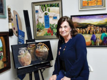 Suzanne Brubaker shows some of her completed works.