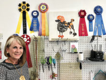 Tami with some of her many ribbons.