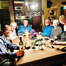 Auctioneer Richard Martin and friends enjoying their dinner