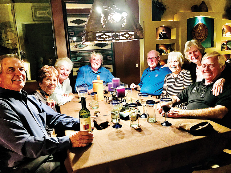 Auctioneer Richard Martin and friends enjoying their dinner