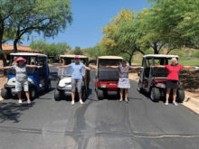 Golfers Julie Davis, Pat Doane, Marji Quire, and Linda Miles (pictured left to right) practicing social distancing