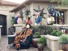 At the Depka Halloween party, the guy in the chair must have had a big margarita.