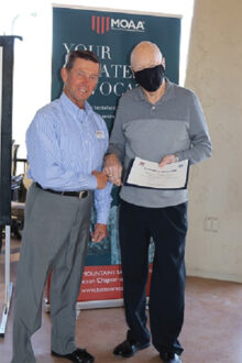 Colonel Nagy presents Certificate of Appreciation and MOAA Challenge Coin to General Connolly.