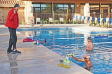 Coach Steve provides instructions. (Photo by Elizabeth Henley)
