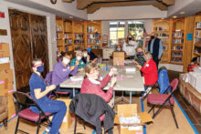 Volunteers arrive early in the morning and prepare hundreds of syringes.