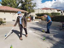 Hans Von Michaelis practicing reach and Ted Birchard practicing kicking while walking.