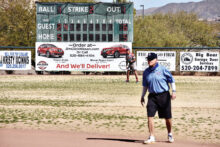 Base umpire Dennis Marchand is in position to make a call at a recent SaddleBrooke Senior Softball game.